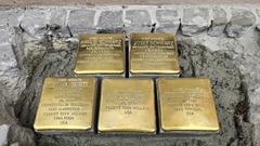 Fünf golden wirkende Stolpersteine wurden verlegt